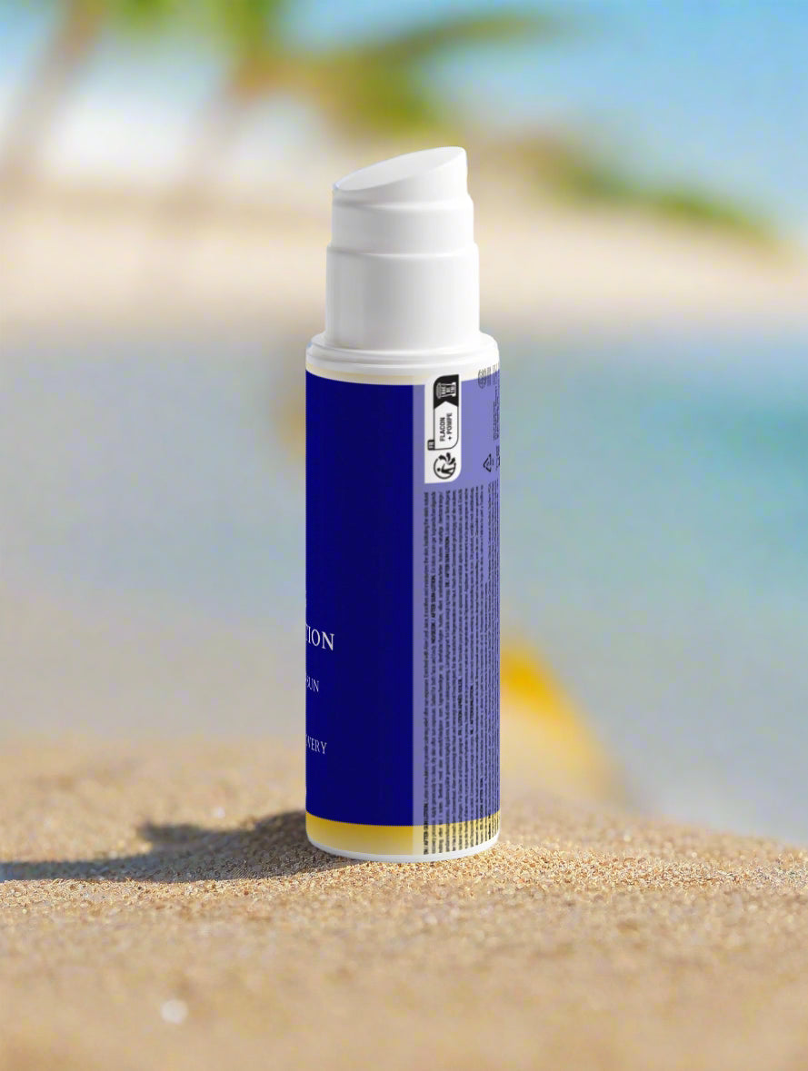Blue skincare bottle with white cap on a light gray background