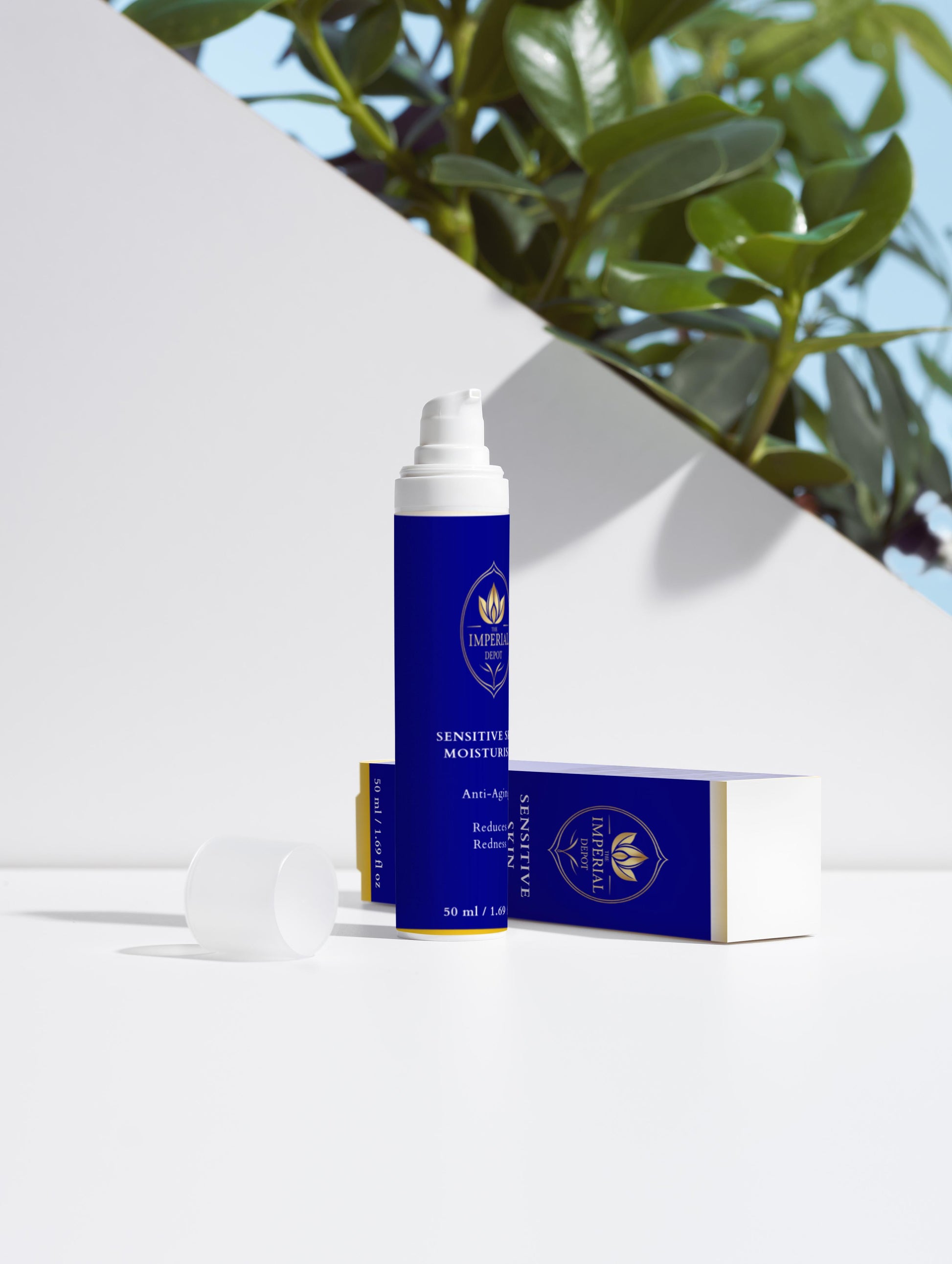 Blue skincare product with packaging on a white background