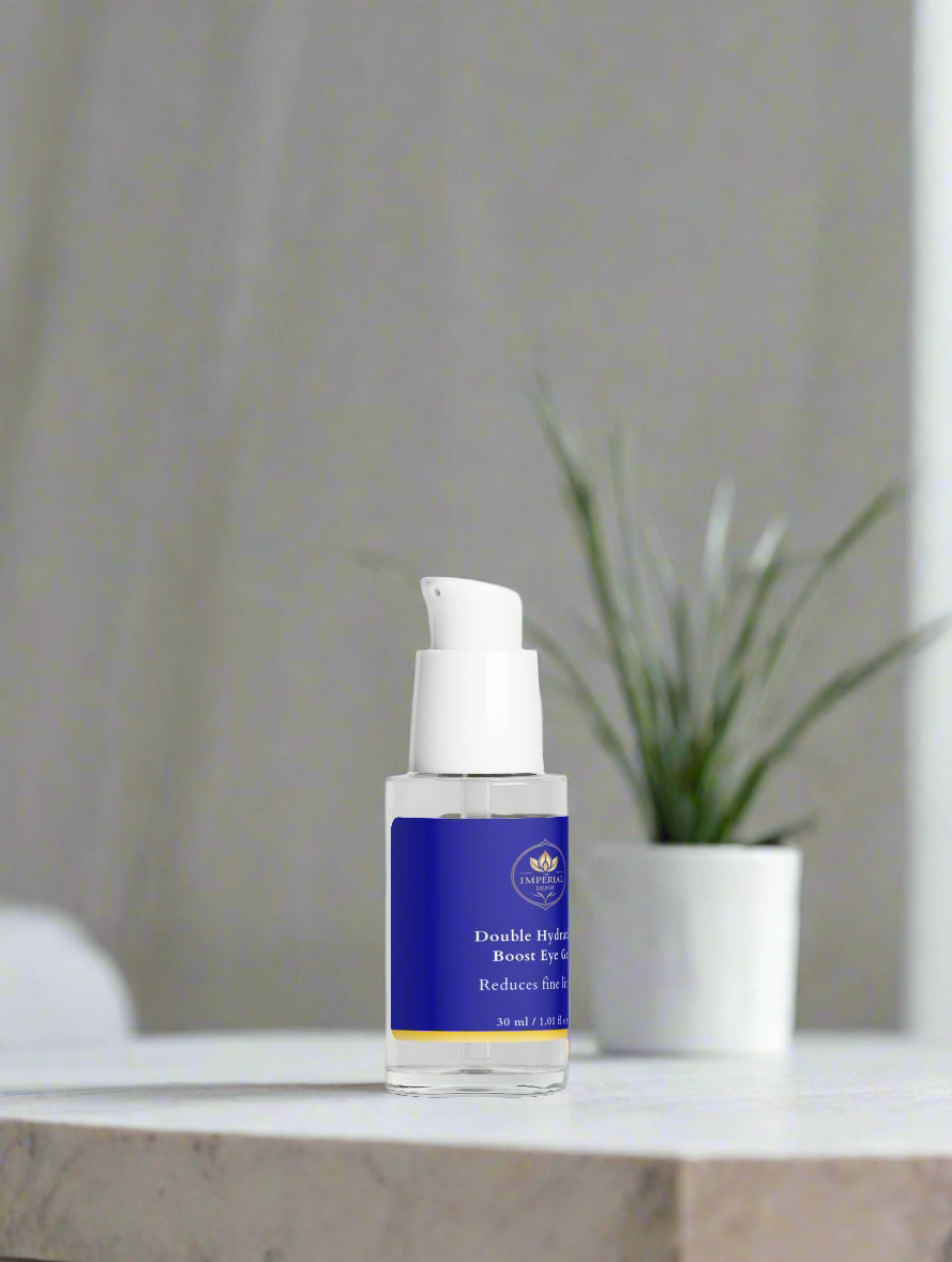 Skincare bottle with blue label on a white surface with a plant in the background