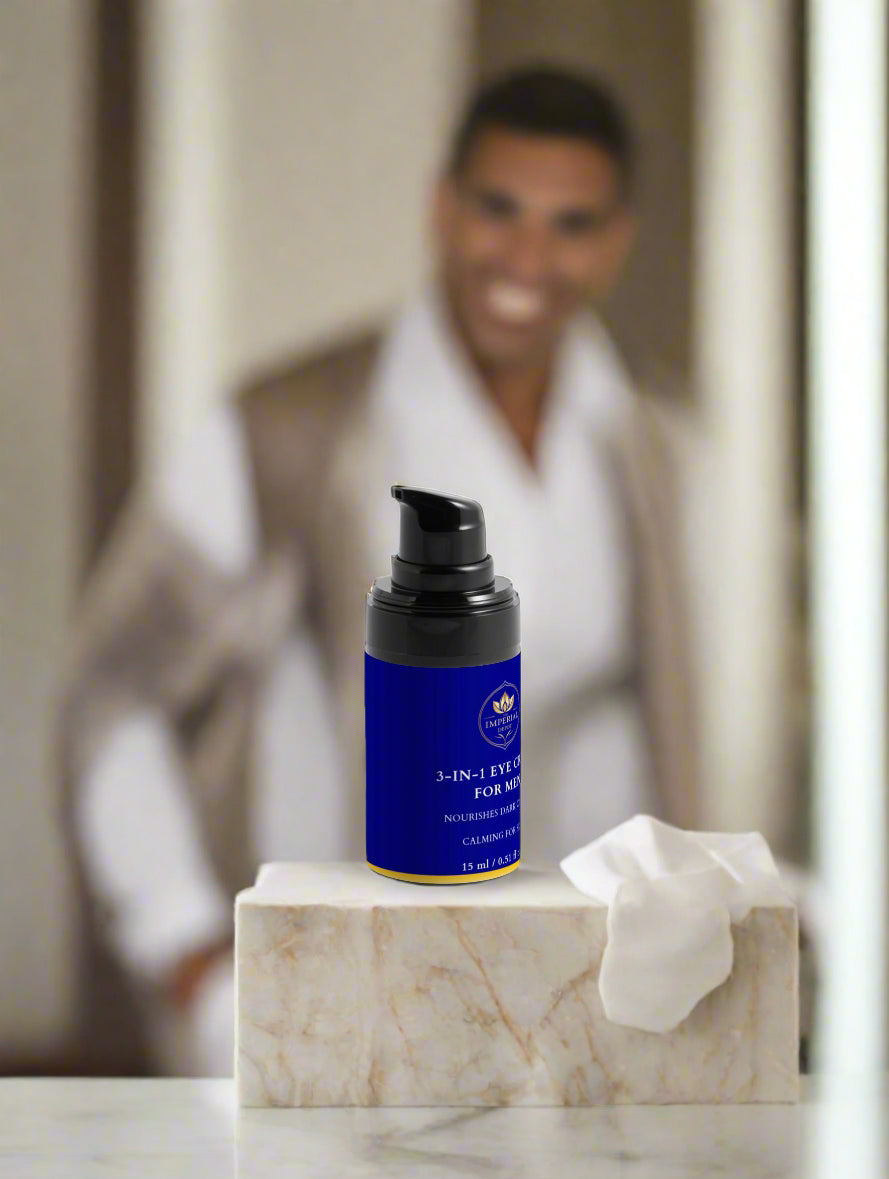 Blue skincare bottle on a marble surface with a blurred person in the background