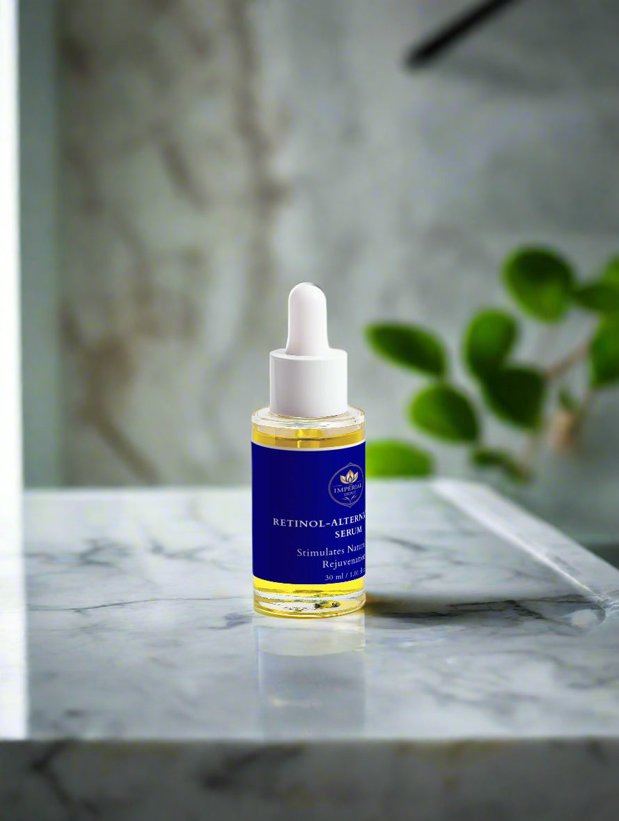 Bottle of retinol serum on a marble surface with a blurred background