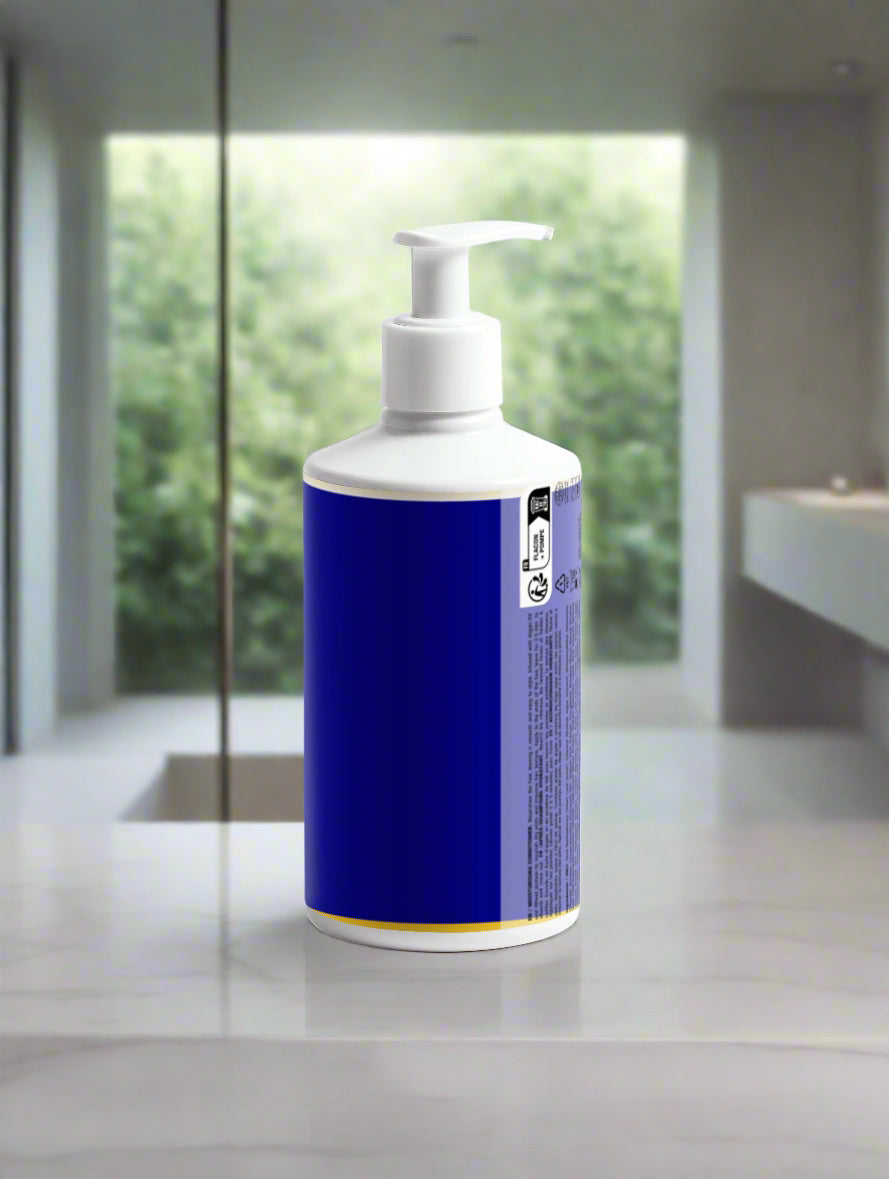 Bottle with blue label and white pump on a light gray background